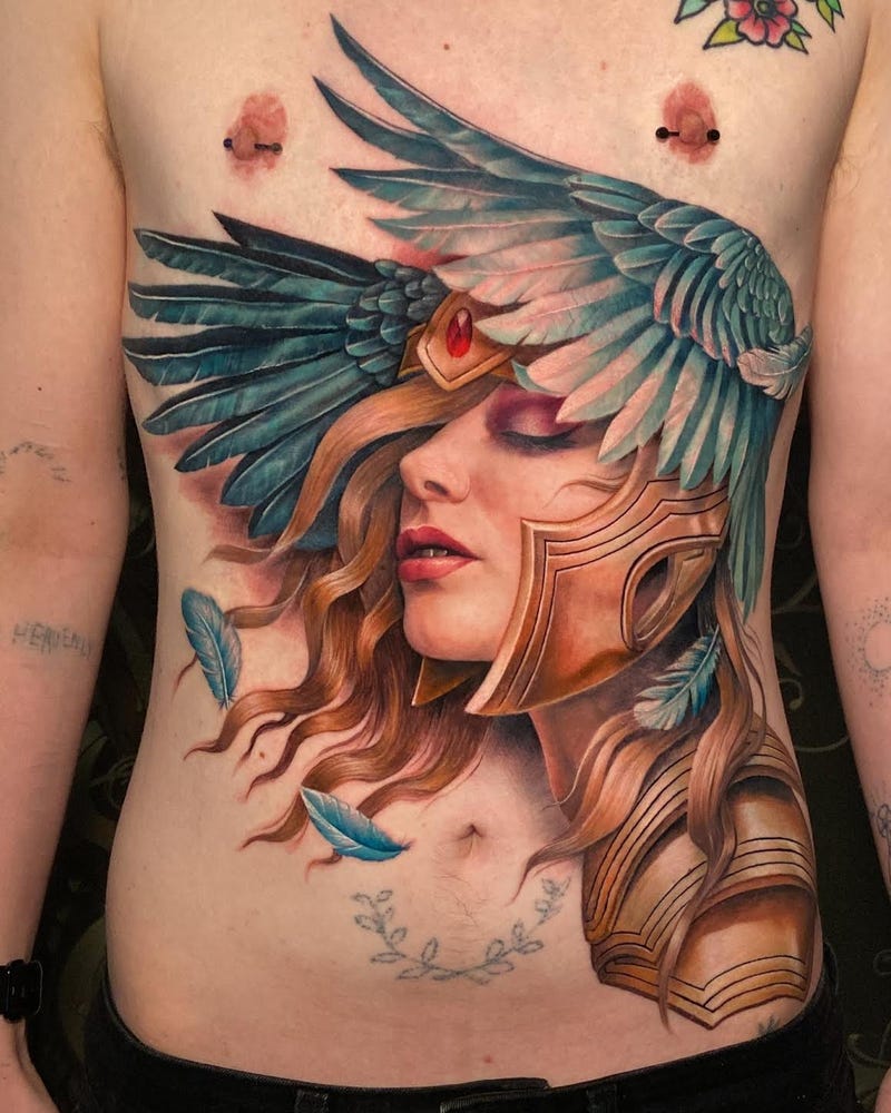 phoenix tattoo over scars