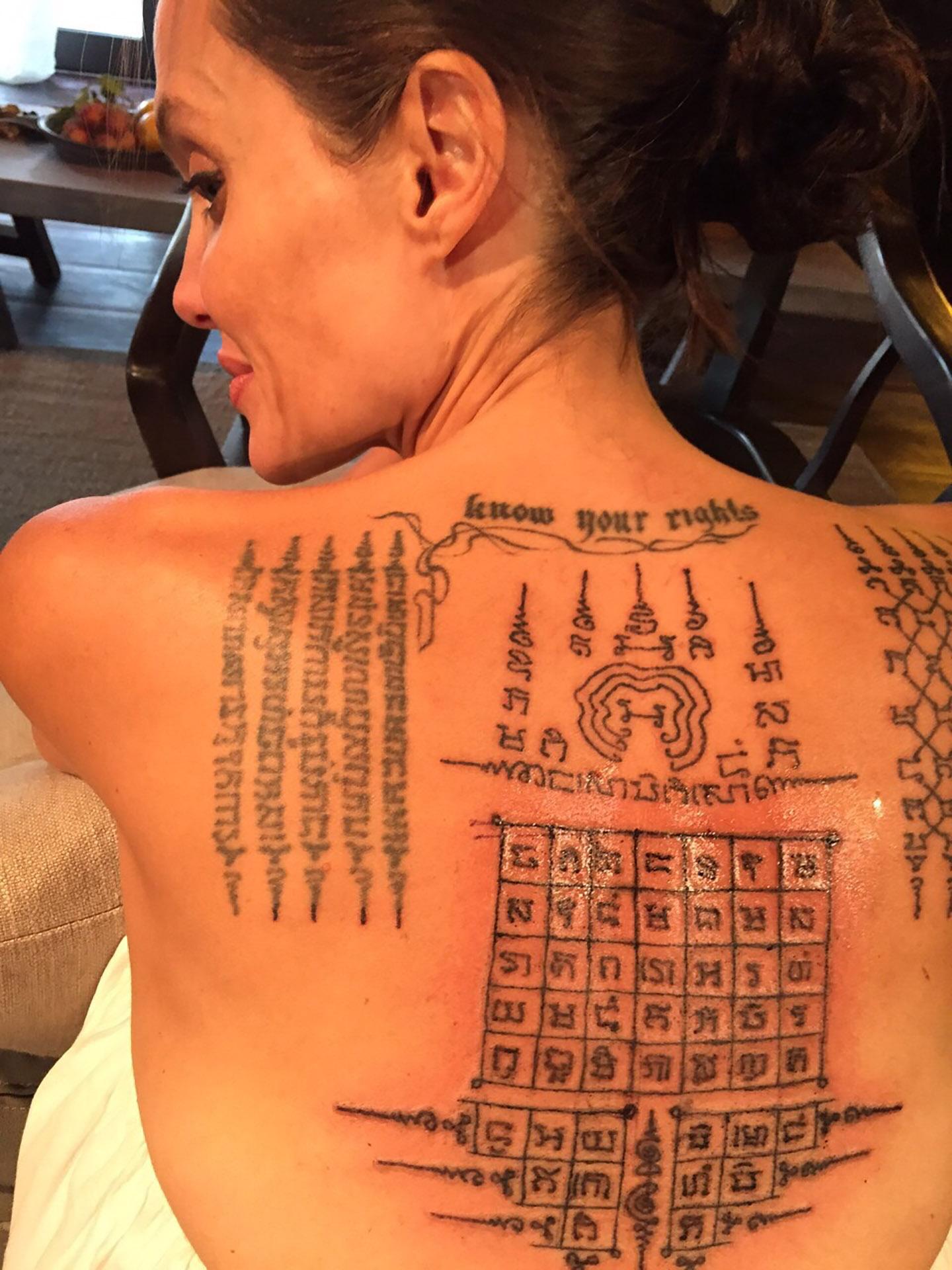 Angelina Jolie back tattoos