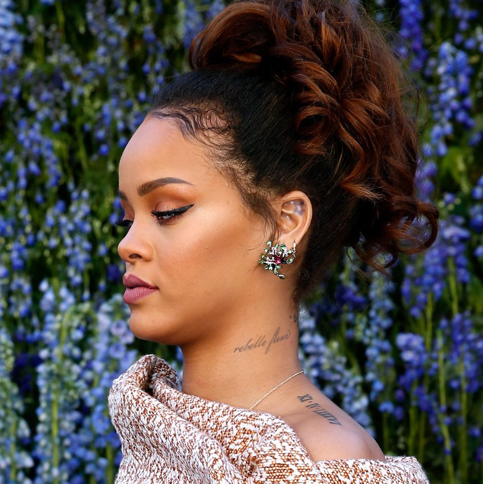 Rihanna tribal hand tattoo