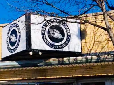 Aggressive Contrast Tattoo Company