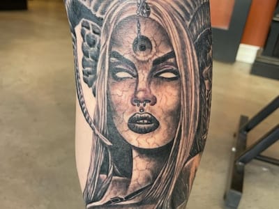 Alpha Tattoos & Piercings