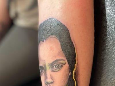 Alpha Tattoos & Piercings