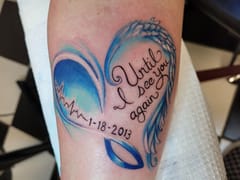 Amen Tattoo & Piercing