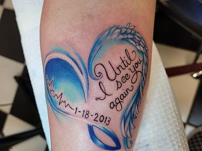 Amen Tattoo & Piercing