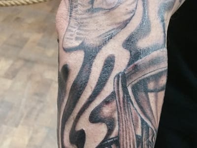 Anchors End Tattoo