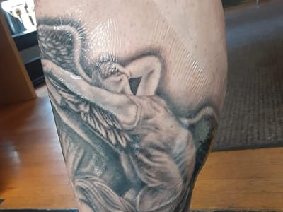 Art In Motion Inc Tattooing