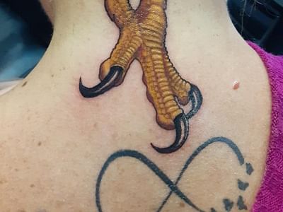 Art In Motion Inc Tattooing