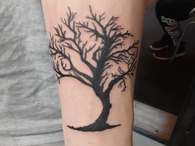 Art In Motion Inc Tattooing