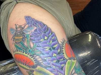 Art in Motion Tattoo