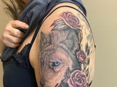 Art in Motion Tattoo