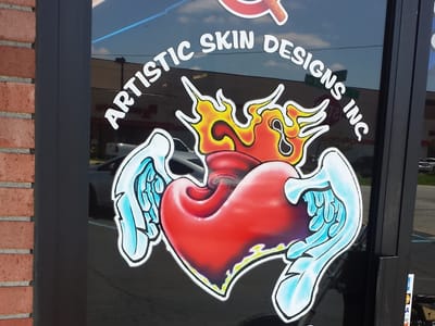 Artistic Skin Designs Inc