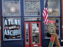 Atlas and Anchor Tattoo