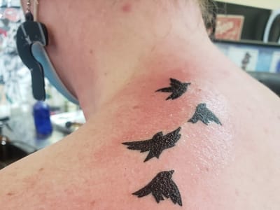 AWS TATTOOS PIERCING