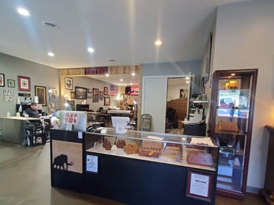 Black Mammoth Tattoo & Piercing