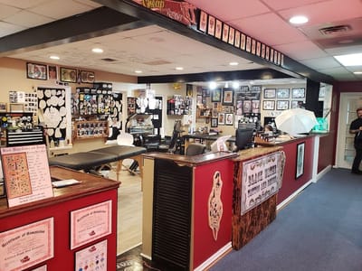 Black Water Tattoo And Design