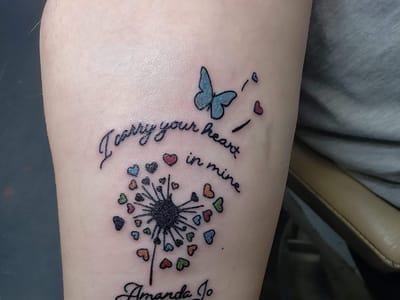 Blue Devil Tattoo and Piercing