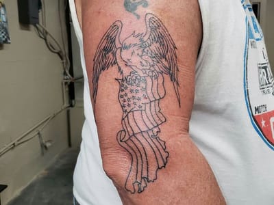 Blue Devil Tattoo and Piercing