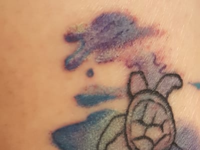 Buzz Ink Tattoo and Barber Shop