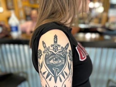 Crawling Squid Tattoo Studio