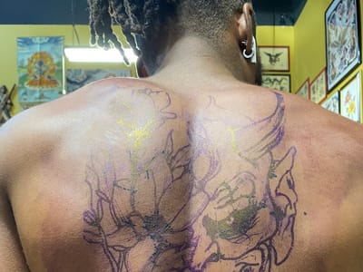 Cupid Slave Tattoo Company