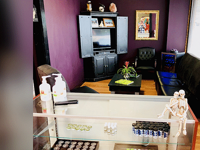 Cupid Slave Tattoo Company