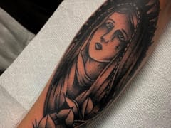 Cursed Mark Tattoos LLC