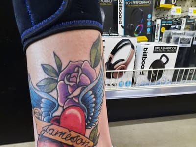 Divine Tattoo and Body Piercing