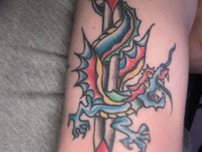 Dos Buddhas Tattoo and Piercing