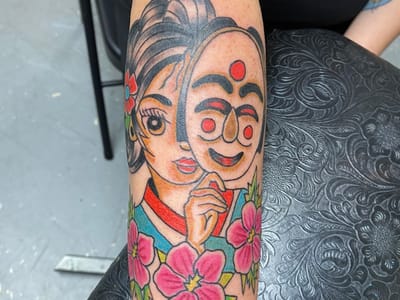 Dos Buddhas Tattoo and Piercing