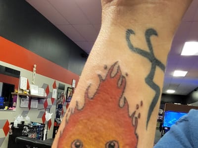 Dragons Den Custom Tattoo Biloxi