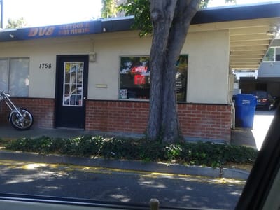 Dv8 Tattoos & Body Piercing