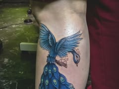 Dystopian Ink & Piercing Llc