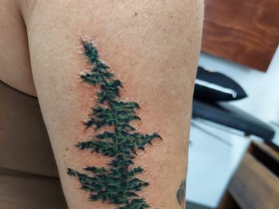 Earth Bound Tattoo and Piercing