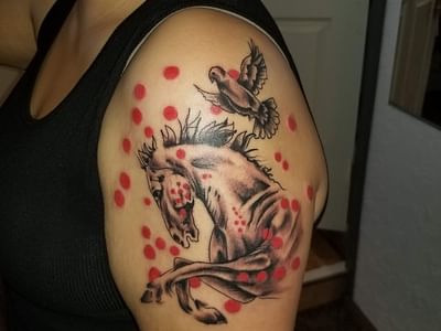 Emerald Monkey Tattoo Parlor