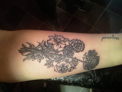 Enchanted Inks' Tattoo & Piercing Studio