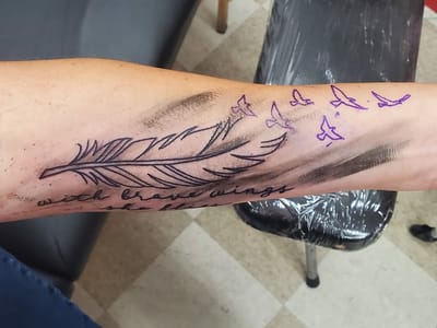 Eye For An Eye Tattoo Parlor