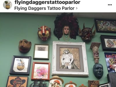 Flying Daggers Tattoo Parlor