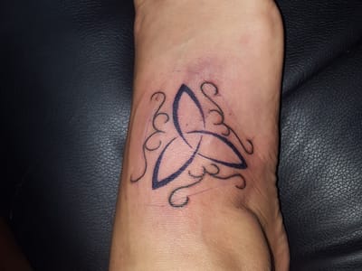 FN Classy Tattoo Body Piercing