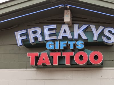 Freaky's Smoke Shop & Tattoo VI Academy
