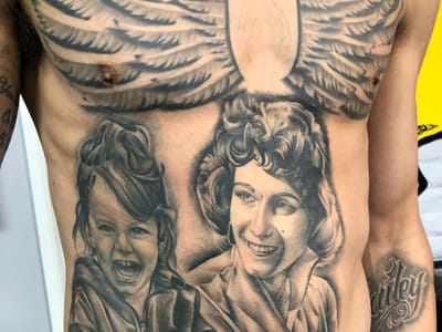 Freedom Tattoo and Piercing