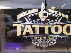 Golden Gun Tattoo
