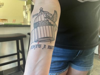 Golden Rule Tattoo and Body Piercing