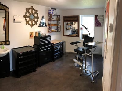 Gray Goat Tattoo and Piercing