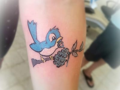 Groovy Rooster Tattoo Company