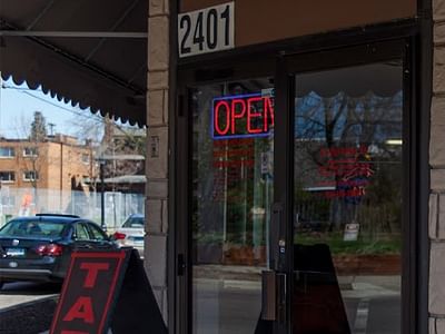 Guns N' Needles Tattoo