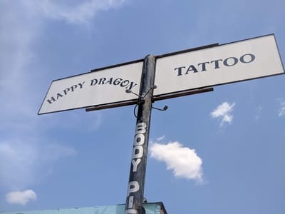 Happy Dragon Tattoo