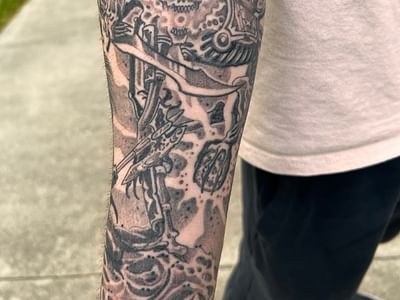 Heart Under Blade Tattoo