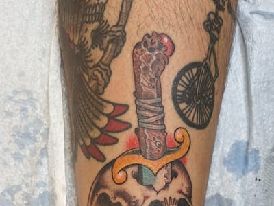 Heart Under Blade Tattoo