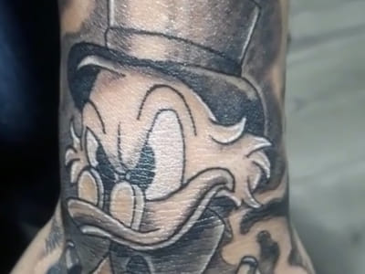 Hellraiser’s Tattoos & Piercings