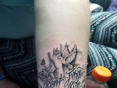 Hired Guns Tattoo & Removal Studio